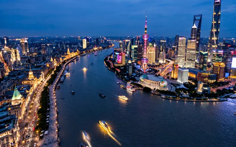 Shanghai skyline over the Huangpu River and Lujiazui at blue hour